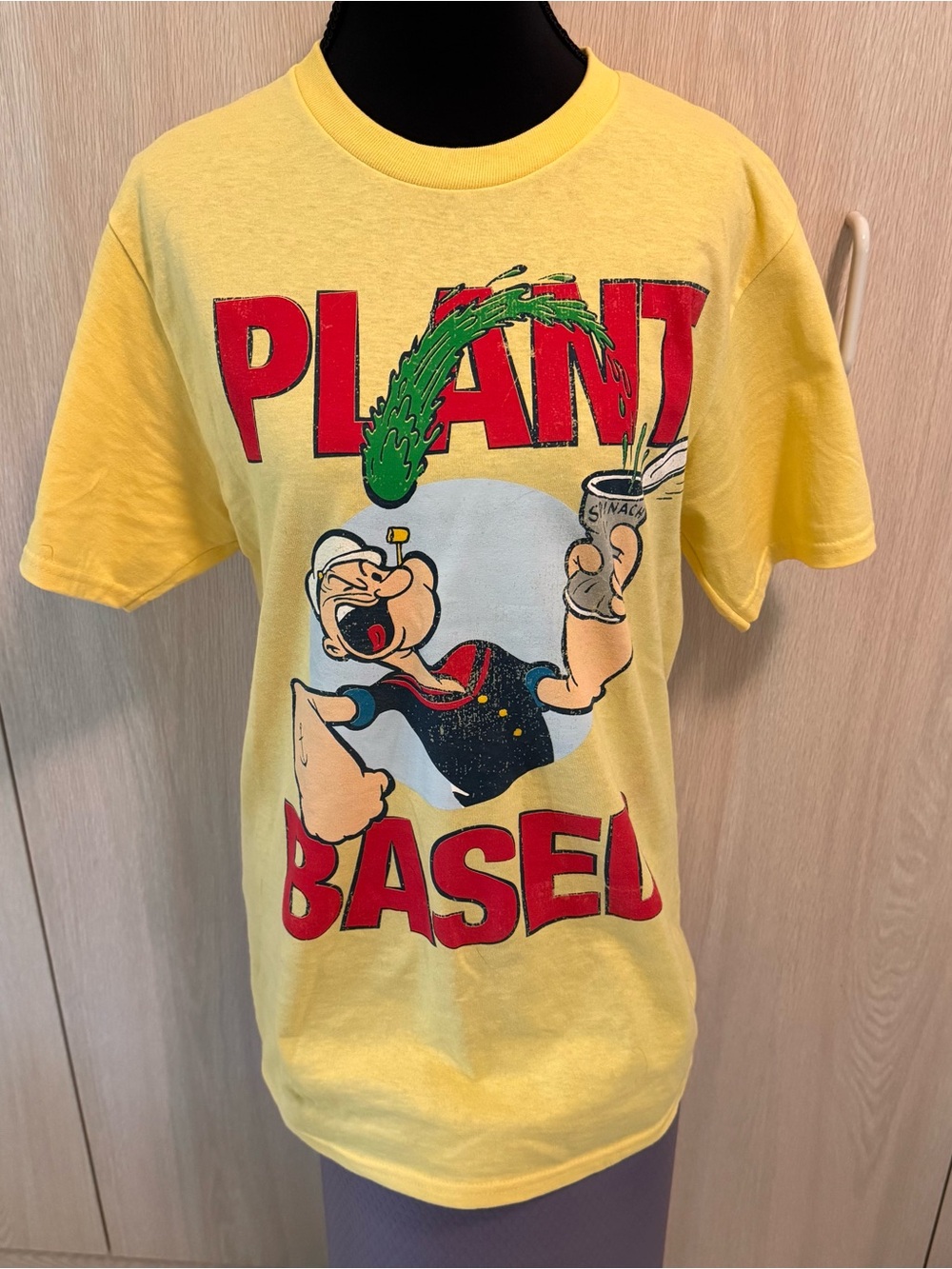 Universal Studios Yellow Popeye Graphic Tee - 'Plant Based’ size Small